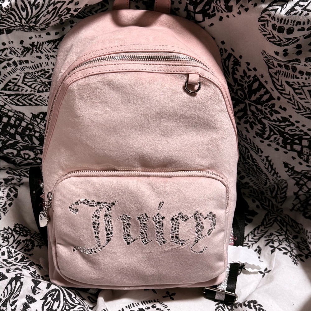 Juicy Couture Pink rhinestones Backpack NWT’s with charms